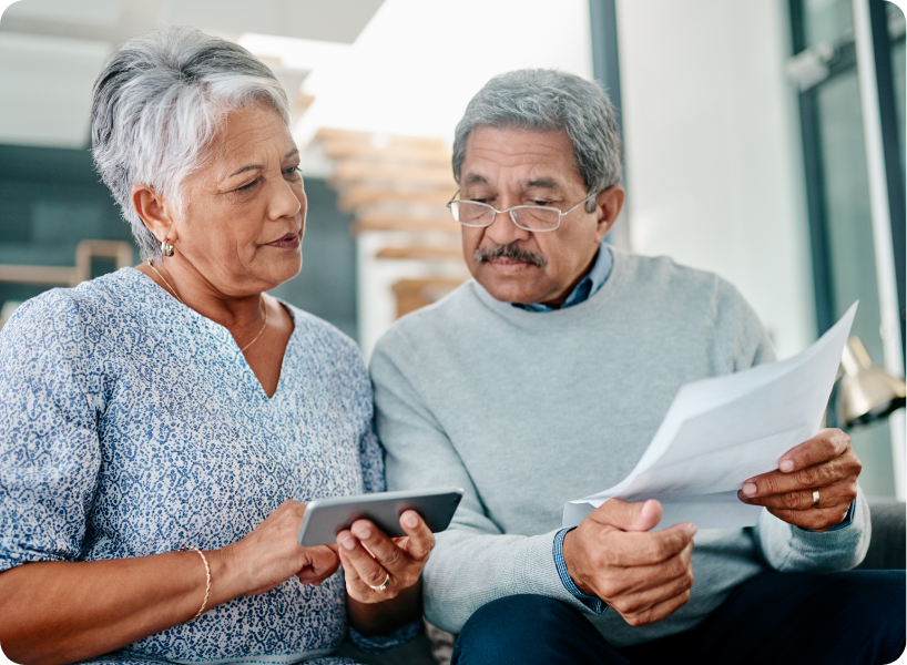 Adults doing financial paperwork