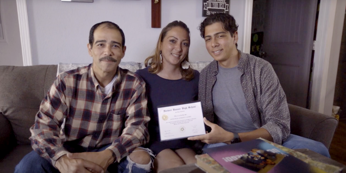 Domanick Castro and his parents at home