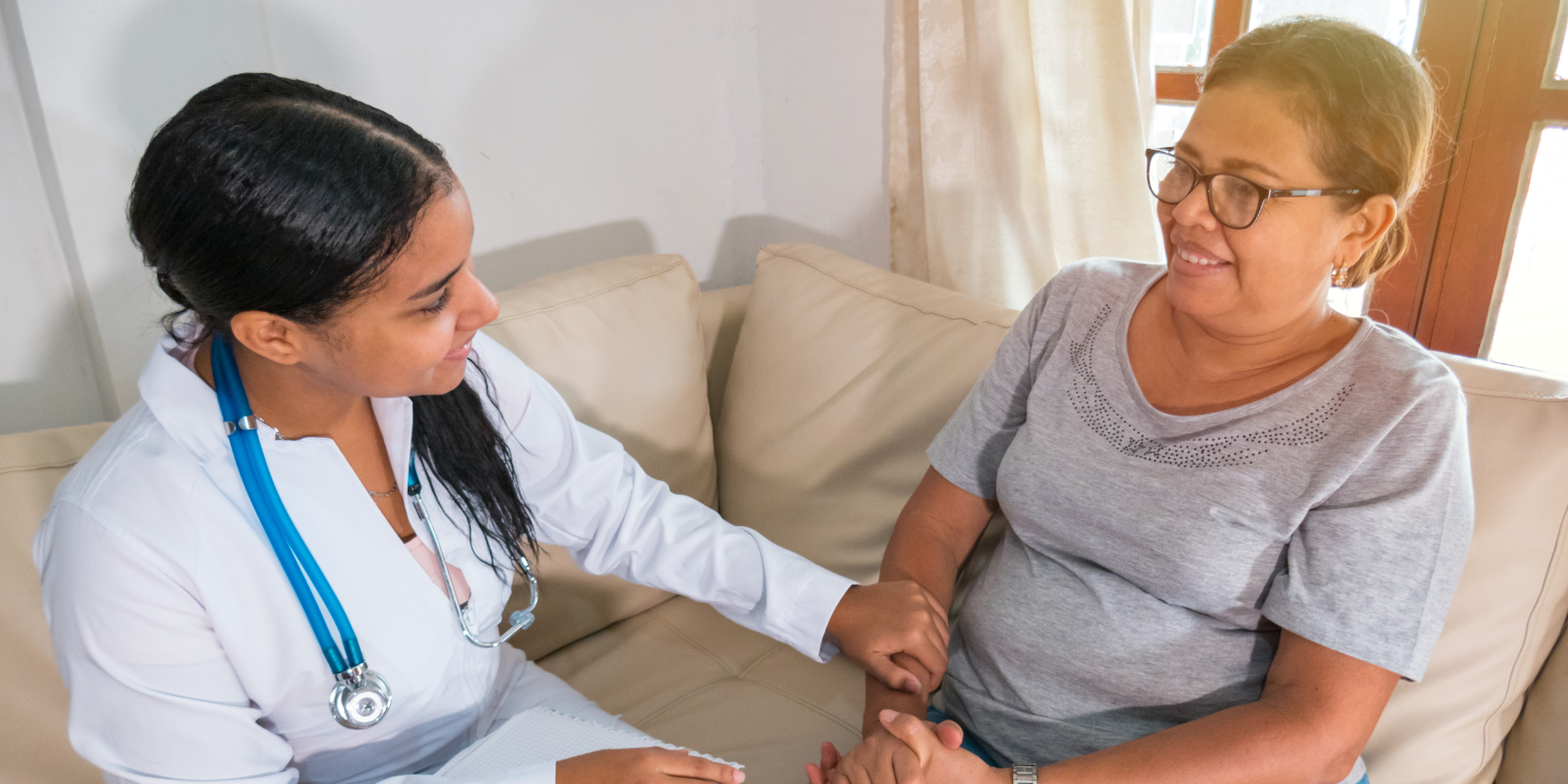 Community health worker with a patient