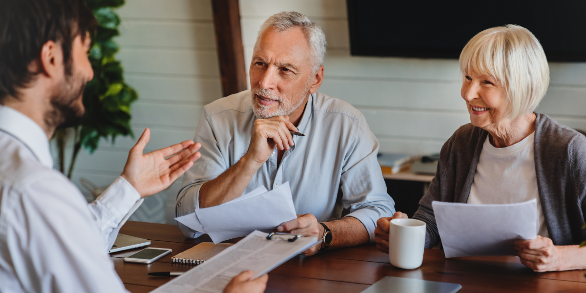 Older adults meeting with an advisor