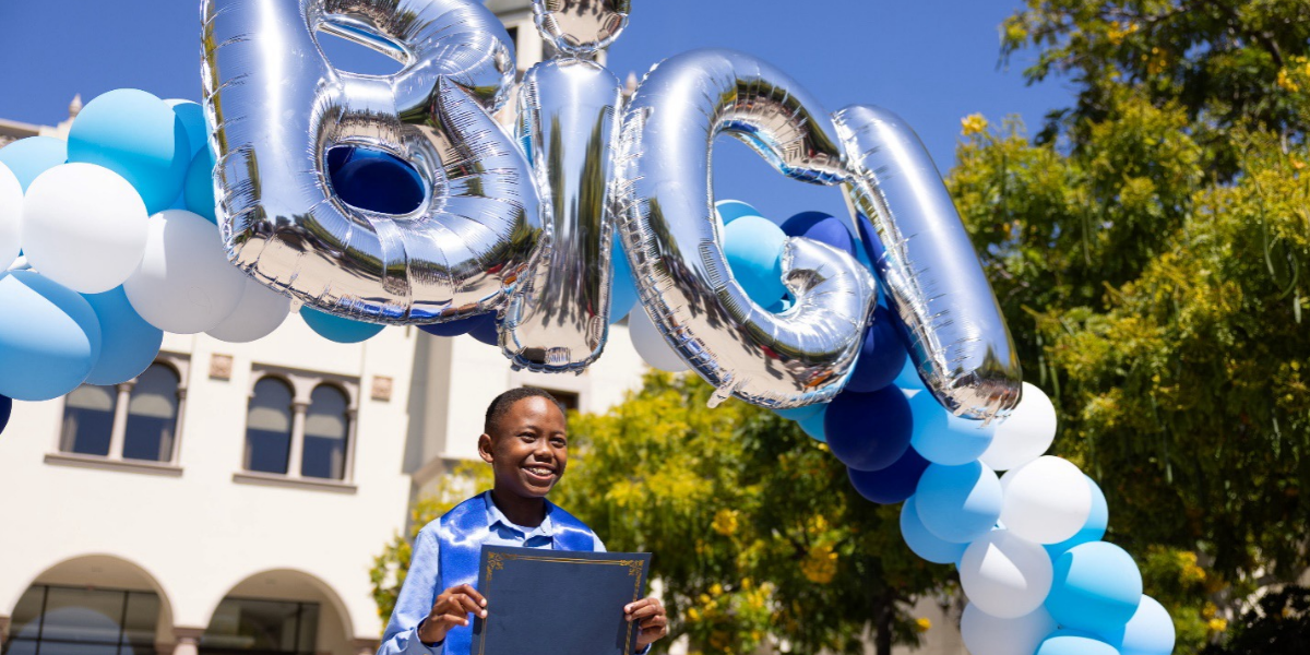 A Black InGenius Initiative inductee poses proudly at USD