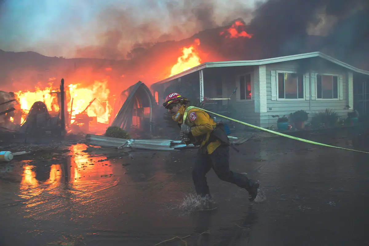 Firefighter Putting Out Fire