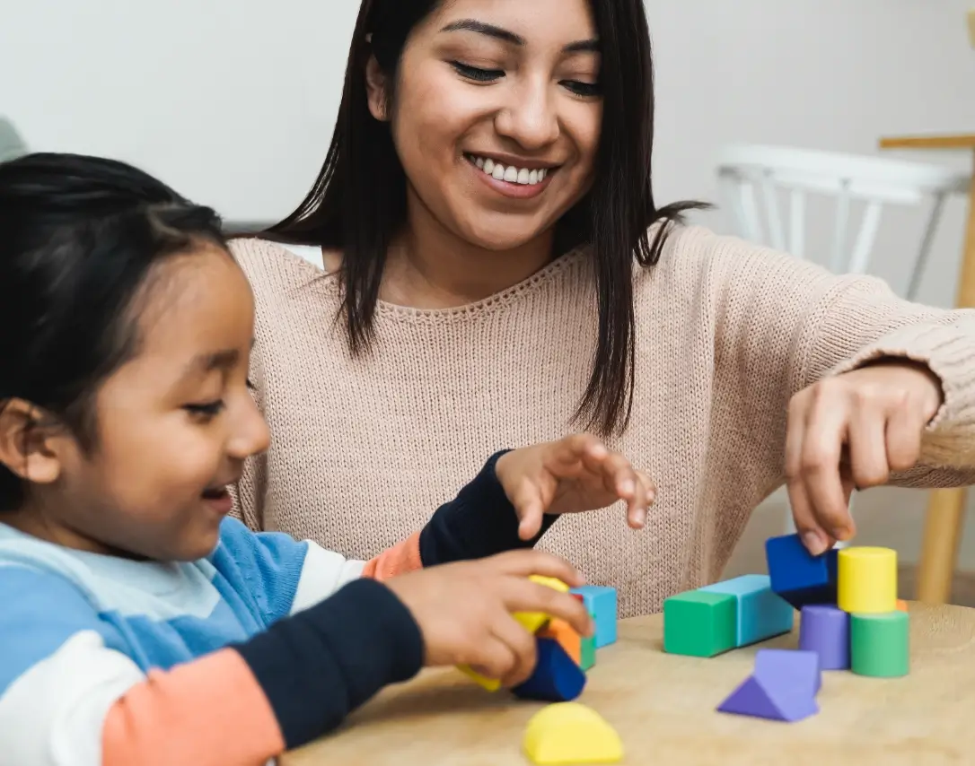 Woman and Child Playing Together