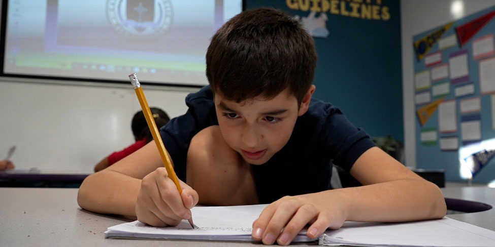 Barrio Logan College Institute Boy Student Studying