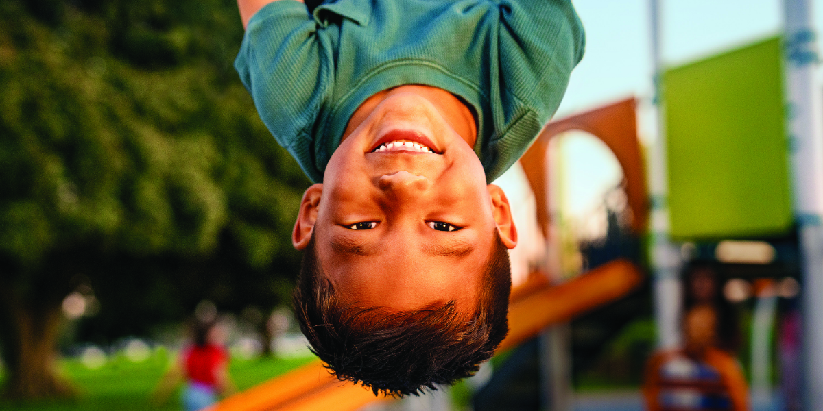 Child playing in playground